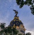 Close up of the dome of Metropolis, one of the most beautiful buildings in Madrid Spain on Gran Via main shopping street