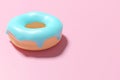 close up a donut with smooth blue icing isolated on pink background 3D rendering design