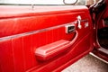 Close-up of the door panel of an old powerful classic American car