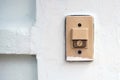 Close-up a Doorbell ring on fence door of home Royalty Free Stock Photo