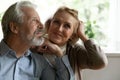 Close up dreamy mature spouses dreaming together, visualizing future Royalty Free Stock Photo
