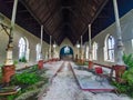 CLOSE UP: Dreary view of inside of a dilapidated old Catholic church in Barbados