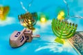 Close up of dreidel and menorah yellow Hanukkah Royalty Free Stock Photo