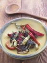 Close up of dried peppers in wooden bowl