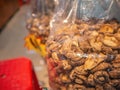 Close up Dried Shiitake Mushroom in plastic bag in the store at guangzhou city Royalty Free Stock Photo