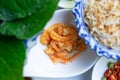 dried shrim on white spoon for miang ingredient