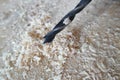 Close-up of the drill head of a cordless screwdriver on wood with sawdust. Wood drill and wood shavings in closeup macro . DIY Do Royalty Free Stock Photo