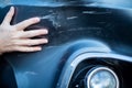 Close Up Of Driver Inspecting Damage To Car After Accident Royalty Free Stock Photo