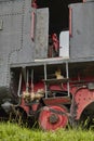 Close up of a drivers cabine and wheels of an old steam funicular in Austria.