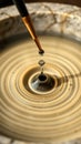 Close-up of Dropper Creating Ripples in Golden Liquid Surface, Ai Generated Royalty Free Stock Photo