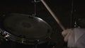 Close-up of drummer hitting drums. Clip. Active playing with sticks on drums. Musician beats rhythms on old drum kit Royalty Free Stock Photo