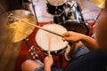 close up of a drummer playing snare and hi-hat cymbals while playing drums