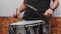 Close-up of drumsticks being played on a drum Royalty Free Stock Photo
