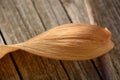 Close-up of dry orchid leaf, dried orchid leaf on wooden background