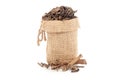 Close-up of Dry Punarnava roots and leaves, in a jute bag. Royalty Free Stock Photo