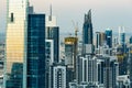 Close up of Dubai business bay towers at sunset. Scenic modern architecture.