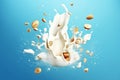 Close up of dynamic splashes of hazelnut milk and flying nuts on a bright blue background