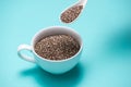 Close-up of ealthy chia seeds in a spoon. Text space. Royalty Free Stock Photo