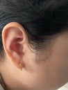 Close-up ear piercing or ear ring girl Royalty Free Stock Photo