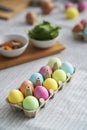 Top view of Easter eggs carton on the table Royalty Free Stock Photo