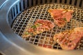 Yakiniku raw beef grilled over charcoal