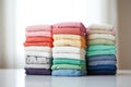 close-up of eco-friendly cloth diapers stacked in various colors Royalty Free Stock Photo