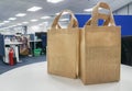 Eco-friendly shopping bags on white table Royalty Free Stock Photo