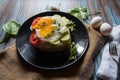 Close up of egg poach, salad condiments on bun bread Royalty Free Stock Photo