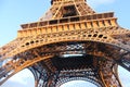 Close-up of the Eiffel tower in Paris with blue sky