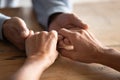 Close up elder woman giving hands to compassionate husband. Royalty Free Stock Photo