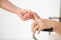 Elderly asian woman using a cane at home with caregiver take care Royalty Free Stock Photo