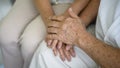 Close up of elderly hands holding each other , Grandfather hands is holding grandma hands , together , family concept