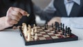 close up elderly playing chess. High quality photo