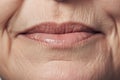 Close up of elderly woman\'s wrinkles around mouth