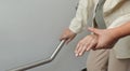 Elderly woman holding on handrail with caregiver Royalty Free Stock Photo