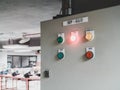 Close up of electric control panel in a factory with indication light.