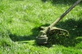 Close-up of an electric grass mower running