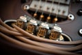 close-up of electric guitar strings, with the hum and twang of the instrument audible Royalty Free Stock Photo