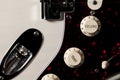 Close-up of electric guitar volume and tone control knobs. Royalty Free Stock Photo