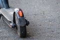 Close-up of electric scooter on the road. Future urban transport in the city Royalty Free Stock Photo