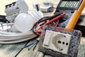 Close-up of electrical components and equipment on aged wooden background Royalty Free Stock Photo