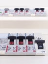 Close up of electrical panel. Perspective view of domestic electrical panel. Light switches. Electric control board. Blurred