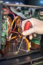 Close up of electrician engineer works with electric cable wires Royalty Free Stock Photo