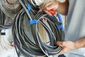 Close Up Of Electrician Fitting Wiring On Construction Site Royalty Free Stock Photo