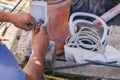 Close up of an electricians connects wires in the house. Royalty Free Stock Photo