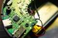 Close Up of Electronic Circuit Board Inside Wireless Headphones Royalty Free Stock Photo