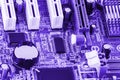Close-up of electronic circuit board with processor toned. Royalty Free Stock Photo