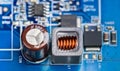 Close-up of electronic components on printed circuit board of a power supply Royalty Free Stock Photo