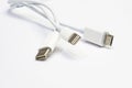 Close up electronic device chargers on white background