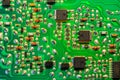 Close-up of an electronic printed green computer circuit board. Royalty Free Stock Photo